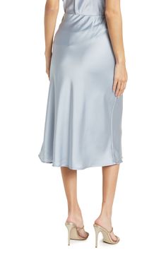 Elevate your wardrobe with this pull-on bias satin midi skirt for elegant, feminine style. 31" length (size S) Elasticized waist Pull-on style Satin construction 97% polyester, 3% spandex Machine wash cold, line dry Made in USA Model’s stats for sizing: 5’10” height, 34” bust, 27” waist, 35” hips. Model is wearing size S. Sleek Spring Midi Skirt, Sleek Spring Pencil Skirt, Midi Length, Sleek Knee-length Spring Bottoms, Satin Midi-length Bottoms For Work, Satin Midi Bottoms For Workwear, Sleek Spring Midi-length Bottoms, Sleek Satin Bottoms Midi Length, Sleek Satin Midi-length Bottoms, Sleek Satin Midi Bottoms