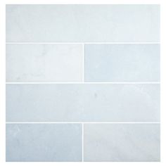 a white tile wall that is very clean