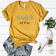 Let It Be Daisy T shirt Daisy Graphic shirt Wildflower | Etsy Daisy Graphic, Vintage Tshirt Design, Floral T Shirt, Boho Tshirts, Wildflower Shirt, Spring T Shirts, T Shirt Flowers, Boho Shirt, Butterfly Shirts