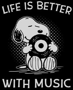 a black shirt that says life is better with music