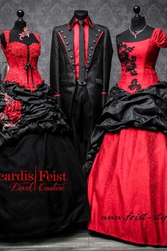 three mannequins dressed up in black and red gowns, one wearing a tuxedo