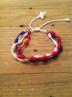 3 in 1 bracelet, red white and blue rosary bracelet. Made with nylon string Adjustable Starting at a 6 in wrist size Adjustable White Rosary Bracelet For Friendship, White And Blue Bracelet, Soccer Bracelet, Usa Bracelet, Knots Bracelet, Bracelet Rosary, Blue Bracelets, Paracord Projects Diy, Blue Rosary