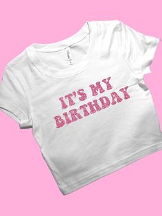 It's My Birthday SNUG FIT Crop Top | Crop Top | Graphic Top | Gift For Her | Y2K Baby Tee | Y2K crop top | Gift for friend Comfy Top to Lounge in! Actual item may be lighter/darker than pictured. M A T E R I A L S - SNUG FIT - 100% RING SPUN COTTON - Shoulder Taping S I Z I N G - Size chart is available on our listing photos. S H I P P I N G  &  P R O D U C T I O N  T I M E - Production Time is 2-3 Business Days. (May be delayed during the Holiday Season) - Shipping Time is 2-5 Business Days. (M Summer Party Crop Top With Letter Print, Trendy Pink Tops For Birthday, White Crew Neck Crop Top For Party, Pink Slogan Top For Birthday, Trendy Birthday Tops With Funny Text, Fitted Top With Name Print For Birthday, Trendy Crew Neck Tops For Birthday, Trendy Crew Neck Top, Summer Slogan Top For Birthday