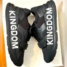 It Sounds Like You Have A Stylish Pair Of Burberry Sneakers With A Striking Design. "Kingdom" On The Side Adds An Intriguing Touch. Enjoy Rocking Your Fresh Kicks! Burberry Sneakers, Burberry Black, Burberry Shoes, Fresh Kicks, Hot Sneakers, Sounds Like, Mens Shoes Sneakers, All Black, Black Color