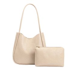 The Mischa by Melie Bianco is a double-handle tote bag made from recycled vegan leather and non-toxic hardware. The front and back feature an embossed woven print. Includes a removable zip pouch to keep your most important belongings secure. Recycled Vegan Leather 11"W x 10"H x 2.5" D Handle Drop: 12" Magnetic Closure Gold-Hardware Interior Zip Pocket Exterior Slip Pocket Removable Zip Pouch Unlined Fits up to a standard-size tablet Eco-friendly Tote Shoulder Bag With Detachable Handle, Eco-friendly Shoulder Bag With Detachable Double Handle, Eco-friendly Large Capacity Leather Shoulder Bag, Large Capacity Leather Shoulder Bag, Cream Handheld Hobo Bag For Everyday Use, Eco-friendly Shoulder Bag With Detachable Handle For Daily Use, Eco-friendly Shoulder Bag With Detachable Handle For Everyday, Everyday Handheld Cream Hobo Bag, Eco-friendly Shoulder Bag For Errands