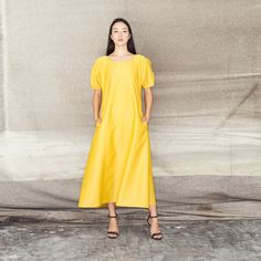 This A-line midi dress has two interesting twists. It has puffed, rounded and wrinkled short sleeves, a round wide neck line and side pockets. It is perfect for office and out of office, because of the messy detail on the shoulder that gives it a playful look. The dress is made of cotton 25% and polyester 75% and it can be machine washed. Stocking Fillers For Him, Jewelry Magazine, Puff Dress, September Birthstone Jewelry, Out Of Office, Stocking Fillers For Her, Street Design, Jewelry Ring Box, Pearl Jewellery Earrings