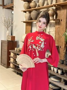 This is an embroidered set. Loose form ( ao dai Dang Suong).  SET ( 1 TOP + 1 DARK RED PLAIN SILK PANT) Style: MODERN ( means the length of ao dai is shorter than traditional ao dai).  Fabric:  Chiffon 0/10 Stretch NOTE: Model is 5'2 wear size S  Pls take a look at the size chart before placing order bc we DO NOT ACCEPT RETURN or EXCHANGED. Please contact us within 3 days of receiving your order if the merchandise damages.  FB:kvshopinusa Embroidered Traditional Ao Dai For Ceremonies, Traditional Cheongsam With Floral Embroidery, Embroidered Ao Dai For Traditional Ceremonies, Traditional Embroidered Cheongsam For Spring, Traditional Long Sleeve Dress For Tea Ceremony, Traditional Dresses For Tea Ceremony, Traditional Embroidered Spring Cheongsam, Traditional Festive Ao Dai With Stand Collar, Traditional Ao Dai For Tea Ceremony