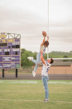 A football couple have a fun photoshoot on a football field Football Field Engagement Photos, Cute Football Couples Pictures, Senior Events