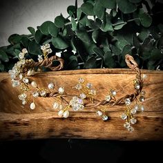 Bridal Hair Vine / Bridal Hair Wreath wrapped in yellow gold and crystal vines. You can also use this as a flower crown base but no flowers are needed as this is stunning all in its own!  I have handmade this piece myself, and this is the only one!  Details:  ~Vine Crown base is made with a  brown faux grapevine sturdy wire with a soft water resistant material.  ~GrapeVine is wrapped in bright yellow gold and crystal vine. Vine measures 20" across when laying on a flat surface, and 1.75"-2" wide Gold Flower Crown Headpieces, Chic Bridal Hair, Gold Fairy Headpiece, Vine Crown, Golden Vine Crown, Gold Flower Crown, Fairy Crown Wire Princess - Bridal And Fairytale Accessories, Bridal Hair Wreath, Hair Vine Bridal