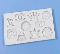 a cookie sheet with different logos on it