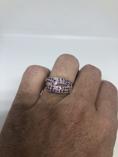 Unusual genuine Amethyst . Sterling Filigree Setting Handmade Size 5 can be re sized for you. My jeweler charges a $10-$20 fee Sterling Silver is rhodium finished to prevent tarnish All rings are shipped in a nice gift box. Check out our over a THOUSAND great reviews Engraving is $4 per letter and is not always perfect depending on the piece. It can take a few days if the jeweler is busy. This is payable to Paypal Judithsltd@gmail.com Multi-stone Pink Sapphire Jewelry For Gifts, Pink Sapphire Multi-stone Jewelry For Gifts, Fine Jewelry Silver Ring With Pink Sapphire, Silver Pink Sapphire Ring In Fine Jewelry Style, Pink Multi-stone Amethyst Ring Gift, Silver Pink Sapphire Rings For Gift, Silver Pink Sapphire Ring As Gift, Silver Pink Sapphire Jewelry With Round Cut, Pink Sapphire Purple Jewelry As Gift