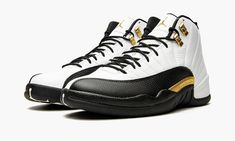 The Air Jordan 12 “Royalty Taxi” is a reimagined version of the original colorway of Michael Jordan’s retro basketball shoe from the late ‘90s that features several new modifications.  A Holiday 2021 release by Jordan Brand, the new-look “Royalty Taxi” or “Royalty” mimics the Air Jordan 12’s original white-and-black “Taxi” color block, but with a few notable variations.  Instead of a black leather mudguard, per the original design, the mudguard found on the “Royalty” is dressed in black suede. Jordan 12 Royalty, Jordan Retro 12, Shoe Palace, Metallic Gold Color, Retro Basketball Shoes, Retro Basketball, Air Jordan 12, Air Jordan 12 Retro, Nike Air Jordan Retro