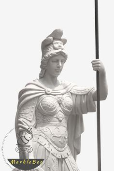 a statue of a woman holding a flag