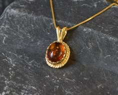 Gold Amber Pendant set with Natural Amber in the highest quality & brownish-yellow translucent resin, at 10x8mm, 3 Carats, sourced from Russia. Gold Dainty Pendant in Vintage design made of Gold Vermeil ☞ thickest 18k Gold Plating on top of Solid 925 Sterling Silver ☞ made to last. Free Gold Vermeil Chain with every Pendant order, 18 inch Silver chain (46 cm) ✓ Matching Ring & Earrings - please ask me ⌛Last Pendant left ⌛ ❀ Each Natural Gem is unique & will have Slight variations from the produc Luxury Gold Baltic Amber Jewelry, Luxury Amber Natural Stones, Luxury Amber Necklaces Fine Jewelry, Cheap Amber Necklaces, Luxury Amber Necklaces With Stones, Luxury Amber Oval Necklaces, Luxury Amber Crystal Necklace, Elegant Style, Elegant Luxury Amber Necklaces, Faberge Jewelry