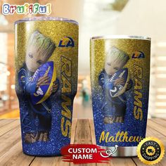 two personalized tumblers with an image of baby groote holding a football