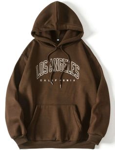 "Introducing our timeless \"Los Angeles\" brown hoodie, where classic style meets West Coast charm. Crafted in a rich brown hue with crisp white lettering, this hoodie is more than just an article of clothing; it's a statement piece that encapsulates the laid-back yet vibrant essence of the City of Angels. The warm brown backdrop serves as a canvas for the bold \"Los Angeles\" lettering in elegant white. It's a design that reflects the city's diversity, creativity, and the seamless fusion of urb Trendy Sweatshirts Hoodie, Brown Hoodie Aesthetic, Trendy Hoodies Women, Hoodies For School, Brown Nike Sweatshirt, Shein Hoodies, Hoodies Shein, Hoodie Print Ideas, Clothes Brown