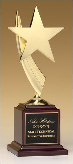 an award trophy with a star on top