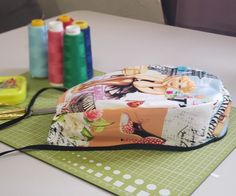 sewing supplies on a table with scissors and thread