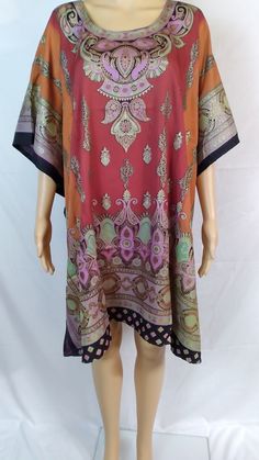 "Beautiful Bright Kaftan Top/Dress/Cover-up with Matching Fringes, with a Border of Blue Ribbon. Hebrew Israelite Fringes! Price includes Fringes! Bold Vibrant colors, Pleasant to the body, Waist tie. A great addition to your Summer wardrobe! Mannequin in photo is 5'8\" inches tall. *All dresses come with Fringes! If no Fringes are in the photo, it means you get to choose the color of Fringes to be added! I carry all colors of Fringes." Multicolor Printed Short Sleeve Tunic, Multicolor Short Sleeve Tunic For Beachwear, Multicolor Floral Print Short Sleeve Tunic, Multicolor Short Sleeve Beachwear Tunic, Patterned Short Sleeve Kaftan For Summer, Casual Multicolor Tunic Kaftan, Casual Multicolor Short Sleeve Kaftan, Multicolor Printed Short Sleeve Kaftan, Multicolor Floral Print Kaftan With Short Sleeves