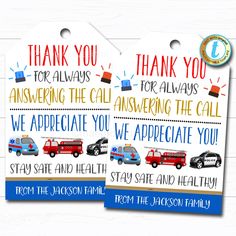 two thank tags with different vehicles on them