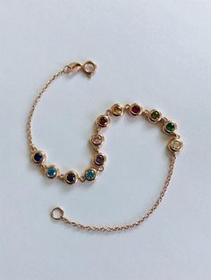 How to order bracelet:1- Choose ''How many birthstone you want''2- Choose ''Material''3- Write preferred BIRTHSTONES  to ''Add your personalization'' section     or     write them to ''Note To Seller'' section at Check out please.Gold Karat:  14K (Bracelets are making from 14k solid gold)Lenght : 7 inchesStones Size : 3mm zirconiasAvailable Materials;14K Gold14K Rose Gold14K White GoldBIRTH MONTS - BIRTHSTONESJanuary - - - -GarnetFebruary - - -AmethystMarch - - - - -AquamarineApril- - - - - - Cl 14k Gold Birthstone Bracelet For Anniversary, Yellow Gold Sterling Silver Tennis Bracelet As Gift, 14k Gold Gemstone Tennis Bracelet As A Gift, Yellow Gold Birthstone Bracelets For Birthday, Yellow Gold Birthstone Bracelet For Birthday, 14k Gold Bezel Set Tennis Bracelet As Gift, Gold Tennis Bracelet As May Birthstone Gift, Yellow Gold Multi-stone Tennis Bracelet As Gift, Gold Multi-stone Bracelet As Gift