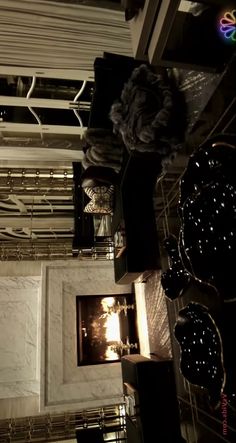 an overhead view of the ceiling in a building with lights and chandeliers hanging from it