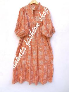 ITEM DESCRIPTION orange-white floral block printed women's maxi dress - neckline with frill collar cotton long maxi dress  Features: 3/4th sleeve, V neck, Long dress Fabric : 100% Cotton cambric hand block printed fabrics  Sleeve Length = 18 inch For more sizes & their measurement, please refer our below chart to understand the sizes variations available with us For your size requirement, please mention your size in seller note at the time of buying. SIZE MEASUREMENT  BUSTLENGTHSHOULDER XXS34 inch51 inch13.5 inch XS36 inch51 inch14 inch S38 inch51 inch14.5 inch M40 inch51 inch15 inch L42 inch51 inch16 inch XL44 inch51 inch16.5 inch 2XL46 inch51 inch17 inch 3XL48 inch51 inch18 inch   Company Return Policy:  Please write for more information to my email directly CHOOSE "ASK SELLER QUESTION " Orange Floral Print Maxi Dress, Orange Floral Print Floor-length Maxi Dress, Bohemian Orange Cotton Maxi Dress, Orange Cotton Bohemian Maxi Dress, Orange Bohemian Cotton Maxi Dress, Frill Collar, Cotton Long Dress, Block Printing Fabric, Necklines For Dresses