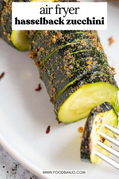 an air fryer hasselback zucchini on it and is ready to be eaten