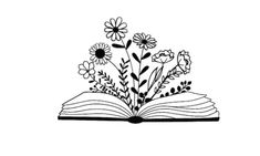 an open book with flowers on it