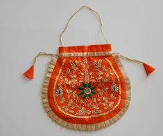 Embroidery Art Work on Money bags and clutches. Handmade Beautiful Designed Small bags for Party and wedding  the size of the item is 8X8 Inches. material  cotton silk Embroidered Rectangular Festive Pouch, Traditional Embroidered Clutch For Festivals, Festive Rectangular Embroidered Pouch, Handmade Pouch Bag For Navratri, Embroidered Clutch Potli Bag Gift, Traditional Handwork Clutch Pouch, Gold Embroidered Pouch For Gift, Traditional Multicolor Embroidered Pouch Clutch, Handmade Festival Potli Bag Clutch