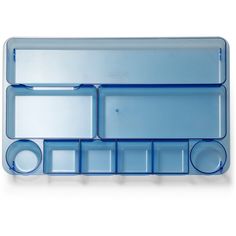 an empty blue plastic tray with compartments on it