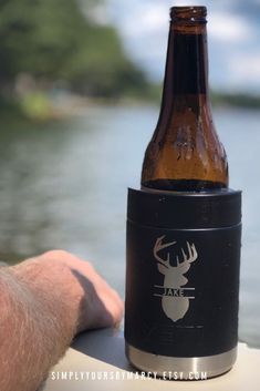 a beer bottle sitting on top of a boat