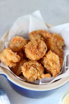 some fried food in a bowl on a table