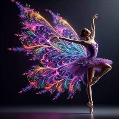 a woman in a purple and blue dress is dancing with colorful feathers on her wings