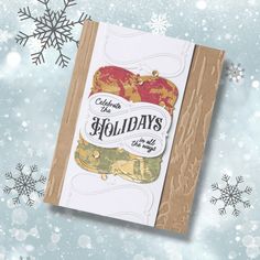 a christmas card with snowflakes and holiday greetings on the front in brown paper