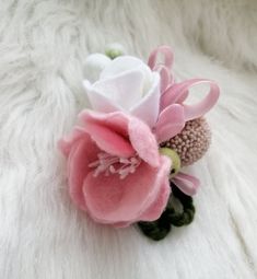 "\"Felted flower brooch, Wedding brooch, Felted jewelry, Flower pin, Felt rose pin, Felt brooch, Wet felted pin, brooch for woman\" Just imagine how many unique looks you'll create with this lovely brooch: With summer dress Bright! On a hat.... Wow! On a handbag Stylish! On a coat Perfect! Your idea? ;-) This pin is almost weightless, soft and very comfy to use. Photo doesn't show how beautiful real colors are. It is a made-to-order items. So, every one is unique but very similar to one pictured Felted Jewelry, Felt Rose, Brooch Wedding, Felt Roses, Felt Jewelry, Pink Pin, Wedding Brooch, Felt Brooch, Felt Flower