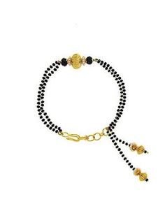 Image result for mangalsutra bracelet Goan Jewellery, Hand Mangalsutra Bracelet, Mehendi Course, Antique Mangalsutra, Couples Rings, Diamond Chains