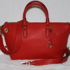 Coach Cara Satchel Sport Red Leather Shoulder Purse Handbag Brand New With Tag Attached Dust Bag Included Color: Sport Red Soft Pebble Leather Inside Zip, Cell Phone And Multifunction Pockets Zip-Top Closure, Fabric Lining Handles With 4 1/2" Drop Outside Zip Pocket Detachable Strap With 21 1/2" Drop For Shoulder Or Crossbody Wear Four Protective Feet At Base 10 1/2" (L) X 7 1/2" (H) X 5 1/2" (W) Ships Fast Same Day Or Next Day Shipping. From A Smoke Free Environment. Red Satchel With Handle Drop For Office, Coach Red Evening Bag, Red Coach Shoulder Bag For Office, Red Coach Evening Bag, Coach Red Satchel With Detachable Handle, Red Coach Satchel With Top Carry Handle, Red Coach Satchel, Formal Red Coach Bag, Coach Red Crossbody Satchel