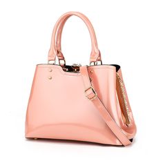 Imported Material:This women's satchel handbag is made of synthetic patent vegan leather. The detachable long shoulder strap makes it easier to be used as a crossbody or shoulder bag. Dimension:Patent Bag Size: 11.4"Wx8.6"Hx 5.5"D, not too small or too big for daily use, Handle Drop: 7", Crossbody Strap: 24". This shoulder bag has a large capacity will keep your Ipad, magazines, keys, umbrella, wallet, sunglasses, phone, lipstick, and cosmetics organizer Feature:Double handles and detachable lon Nana Aesthetic, Cosmetics Organizer, Patent Leather Bag, Patent Leather Handbags, Over The Shoulder Bags, Rhinestone Trim, Satchel Handbag, Pink Purse, Satchel Handbags