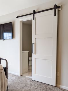 Walston Door Company Painted Door Painted Modern Three Panel Door Modern Sliding Doors White, Sliding Farm Door, Laundry Room Slider Door, Single Barn Door Bathroom, Barn Door Office Doors, Barn Style Doors Sliding, Barn Door Bathroom Ideas, Laundry Room Sliding Door, Modern Barn Doors In The House