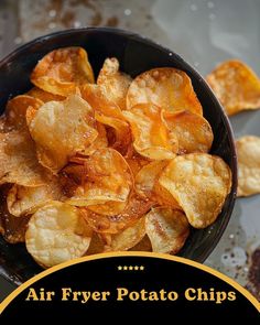 an air fryer potato chips in a black bowl