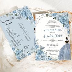 a wedding card with blue roses and a princess's dress on it