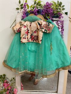 Girls Indian outfit for wedding and party wear Product: Custom made girl kids dress. Fabric:  Lehenga- net with gota stone work border  Top -printed chanderi silk  Dupatta - net embroidered Delivery Time : Please keep me informed for any dates or times frame you keeping in mind. Festival Organza Sets With Pallu Detail, Green Organza Choli With Gota Work, Designer Wear Skirt Set For Festivals, Diwali Designer Wear Salwar Kameez, Green Dupatta With Dori Work, Eid Festive Skirt Set With Zari Work, Festive Skirt Set With Zari Work For Eid, Art Silk Skirt Set With Zari Work For Festivals, Chanderi Sharara For Festivals