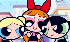 the powerpuff girls are standing together in front of a cityscape with buildings