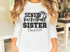 Welcome to SierraAlpineDesigns shop!  Stand proud next to your Senior brother or sister this year with this Senior Basketball Sister Class of 2024 Shirt. Perfect for sports events, Senior Night, Graduation, awards ceremonies and all the other events that you celebrate this year with your favorite players! Let them know how proud you are for everything they have accomplished.  SENIOR BASKETBALL Sister Tshirt listing: https://sierraalpinedesigns.etsy.com/listing/1606706077/senior-basketball-sister-shirt-class-of PRODUCT INFORMATION * Please check the size chart in the product photos for more information about the fiber content for each style and color. * This listing is for the item listed only. Other items in the product photos are for staging purposes and are NOT included in your purchase. Senior Night Shirts, Graduation Awards, Shop Stand, Sister Shirt, Sister Tshirts, Basketball Shirts, Class Of 2024, Game Day Shirts