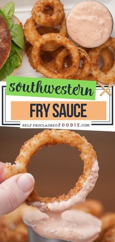 a person holding up a fried fry sauce in front of some onion rings and other food