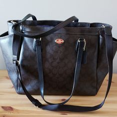 Large Coach Diaper Bag. Paid $350 For It Brand New. Gently Used & Well Maintained. Lots Of Pockets Both On The Outside And Inside. Can Be Zipped Up Or Left Open. Has A Removable Longer Strap. Light Wear On Bottom Corners [Pictured] Can Also Be Used As A Large Purse Or Carryon Roughly 17"X12"X7 Coach Diaper Bag, Luxury Tote Bags, Large Purse, Bags Coach, Lots Of Pockets, Womens Tote Bags, Coach Bags, Diaper Bag, Tote Bags