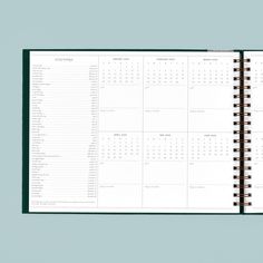 a planner is open on a blue background