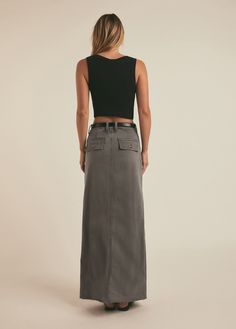 The Sadie Utility Maxi is our favorite jeans alternative. It sits high on the waist with a high center slit and front-slant utility pockets. The skirt is cut from comfortable, high-stretch denim that's been overdyed to an olive green Kalmata hue so this A-line maxi will be a favorite from season to season.62% Cotton, 18% Rayon, 17% Polyester, 3% SpandexMegan is 5'10" wearing size 25. Utility Maxi Skirt, Jeans Alternative, Skirts Sewing Patterns, Utility Skirt, Utility Pockets, Skirt Patterns Sewing, Favorite Daughter, Sewing Skirts, Sewing Inspiration