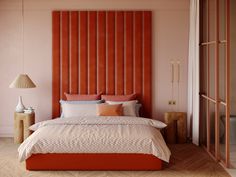 a bedroom with pink walls and orange headboard